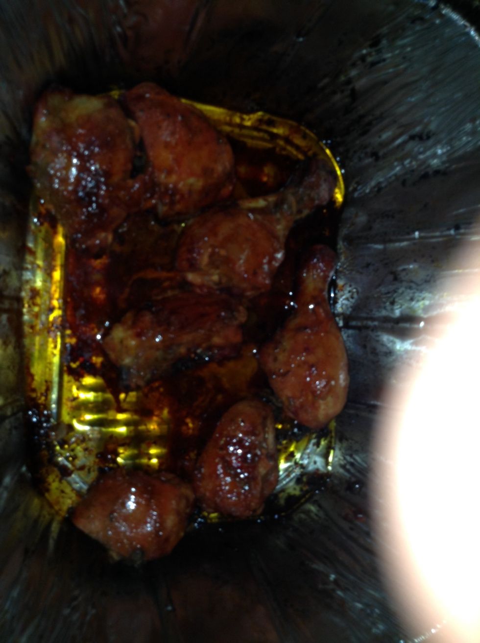 After 15-20 minutes check on them and see if they looked cooked by taking a fork and opening a piece of the chicken if so flip the chicken to the other side and add more oil on the chicken