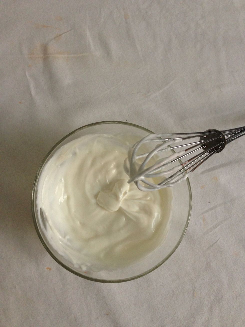 After 15 mins give the napkin a slight squeeze unfold, put in a bowl and whisk. It will give you a cream. If you strain 0% fat yogurt you will get a light 0% fat cream. Use as dip with veggies