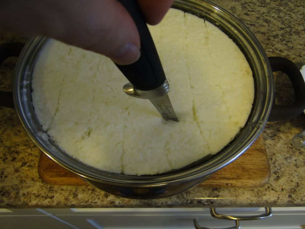 After 15 minutes the curd will be formed, cut into 1" squares with a sharp knife.