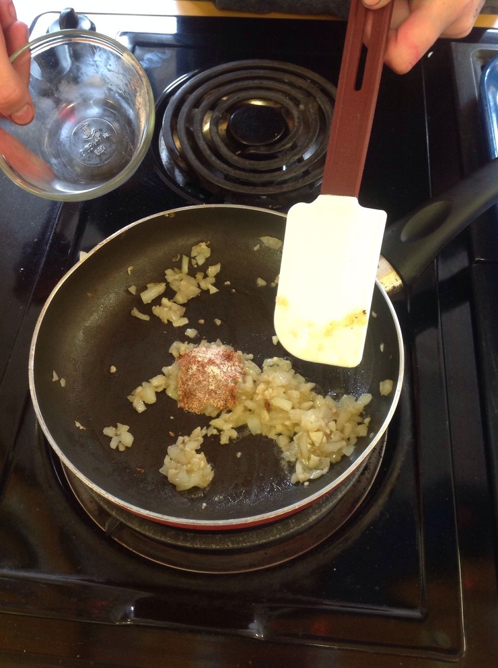 After 2-3 minutes add in the dry spices.