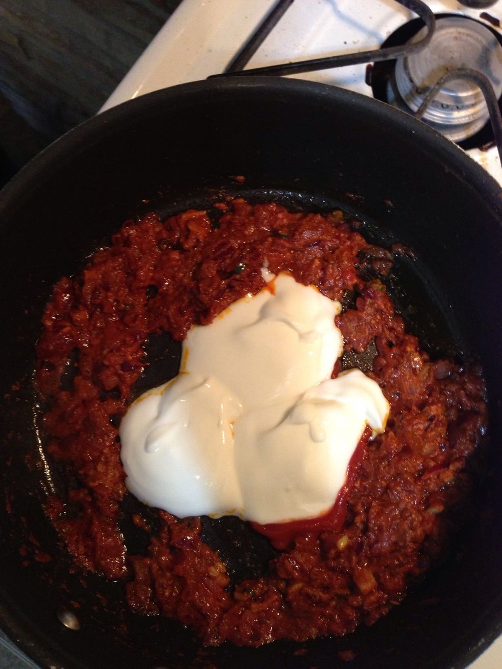 After 2-3 minutes add yogurt and mix well. It will turn into golden curry.