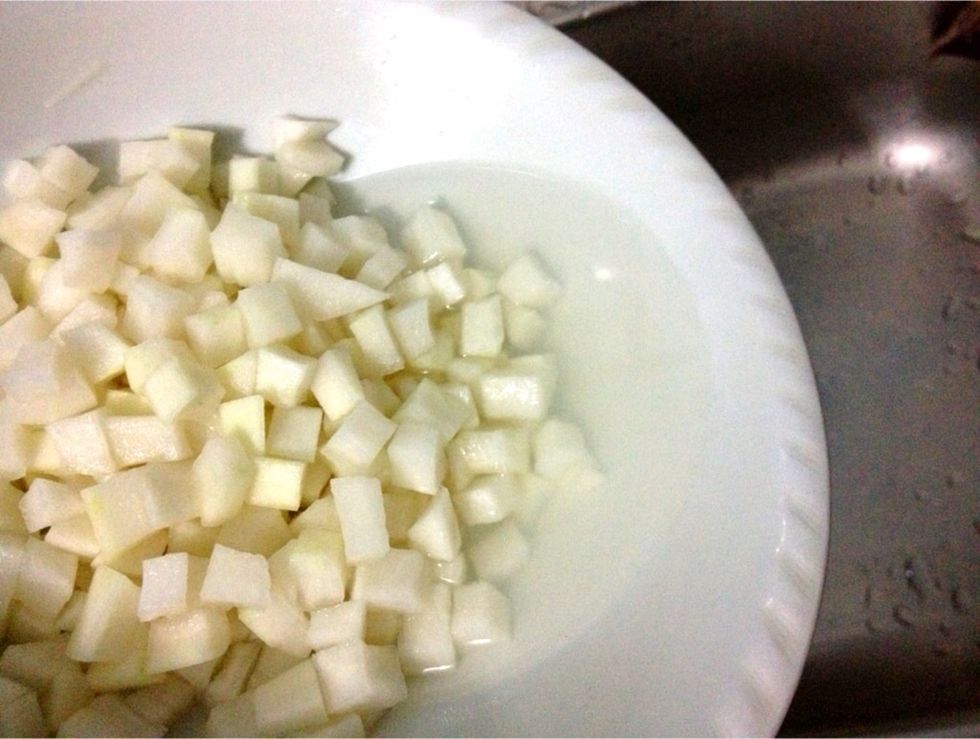After 2 hours, drain the excess daikon-salt water. Rinse well and drain