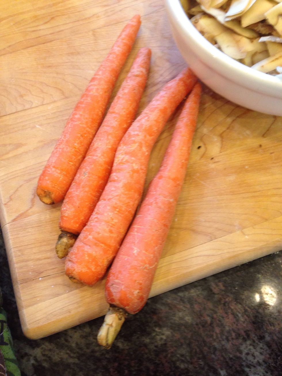 After 2 hours, start your carrots! Peel and chop them.