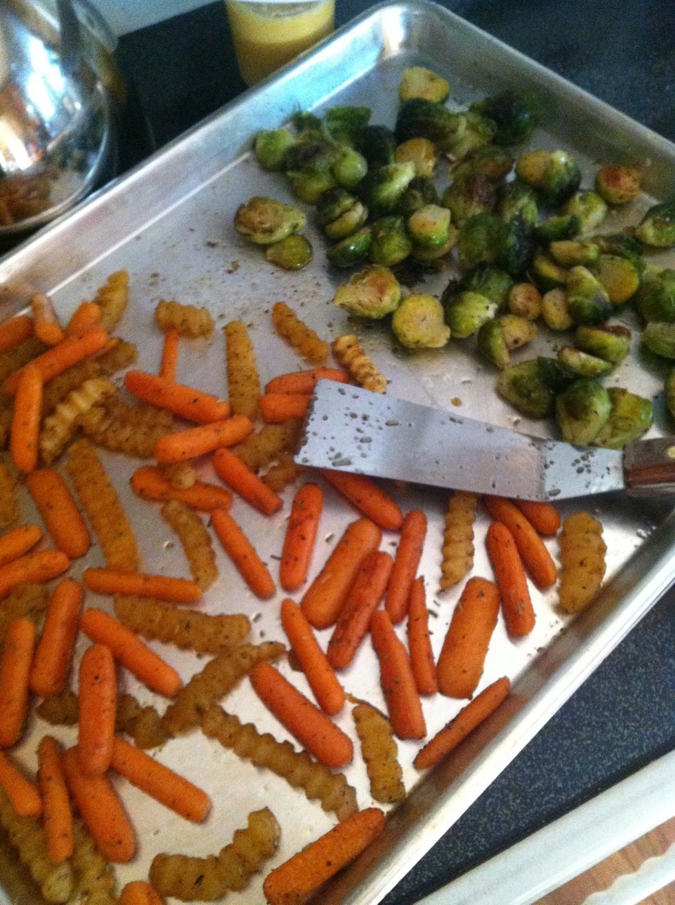 After 20 mins, take out of oven and stir the yumminess around. The next go 'round, the sprouts only stay in the oven for about 15mins, then they come out