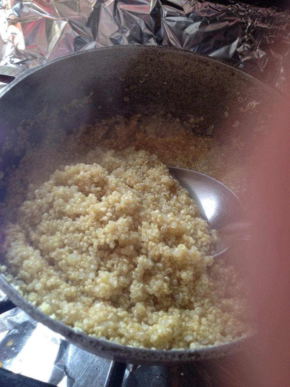 After 20 minutes of cooking quinoa it will be fluffy and ready for the veggies mix it's way in.