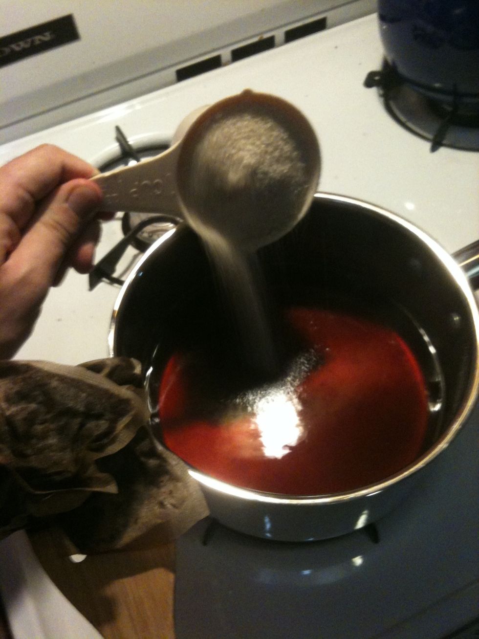 After 20 minutes, remove the tea bags and add in the 1 cup of cane sugar. Mix well.