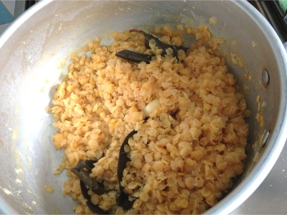 After 20 mnts or so, the cooked lentils will look like this. The orange color is slightly turns into pink.