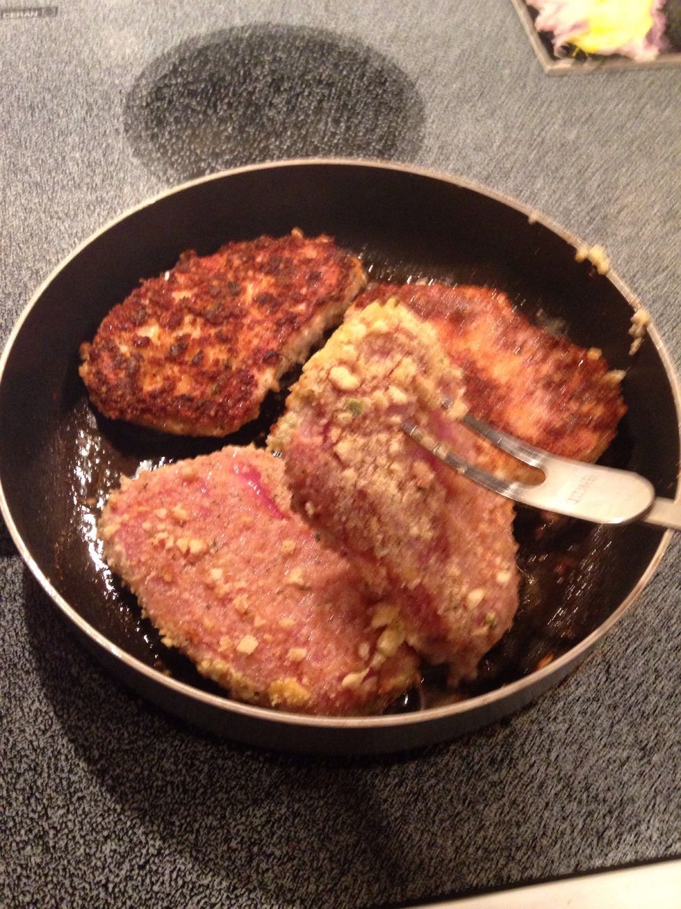 After 3-4 minutes, flip pork.