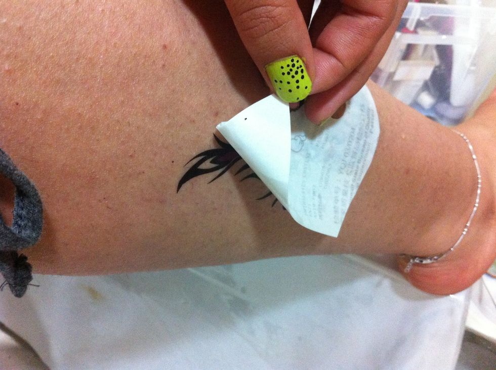 After 3-5 minutes, remove the paper slowly and u will see the tatoo on ur body