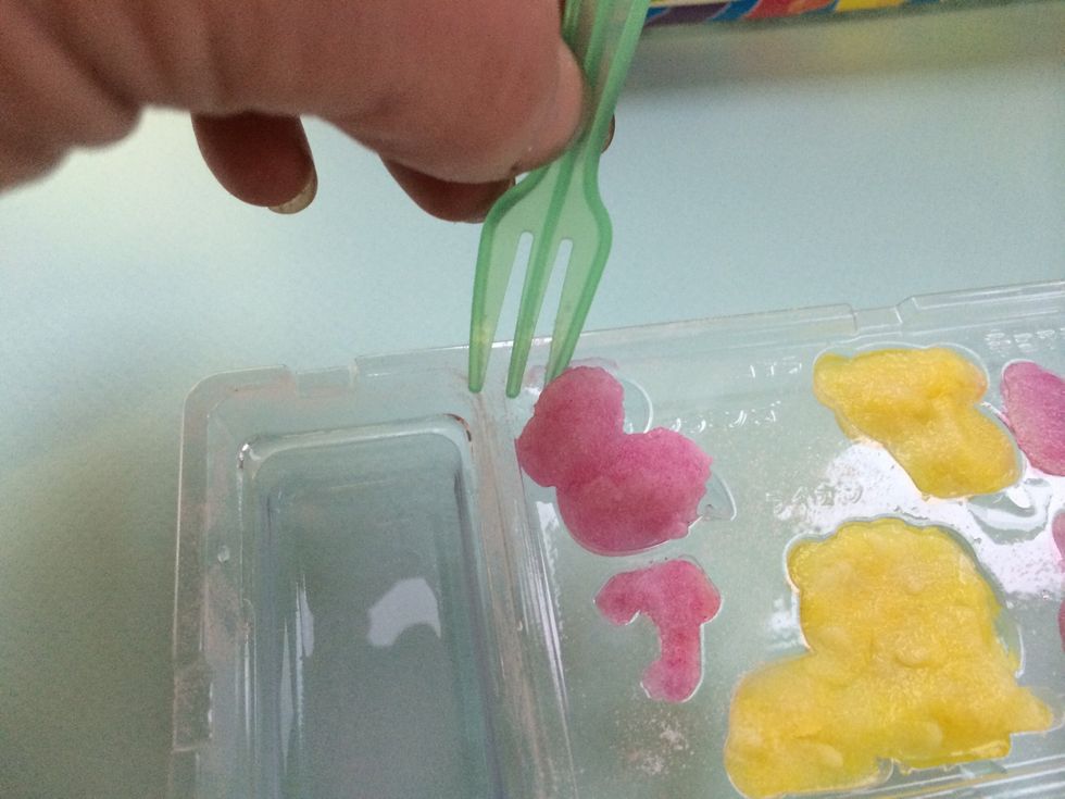 After 3-5 minutes, the longer the better.Peel around edges with fork to loosen gummies from mold