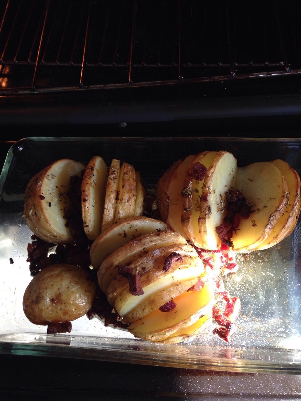 After 30 mins drizzle more oil mix over , sprinkle on the lardons and return to oven for 15 mins