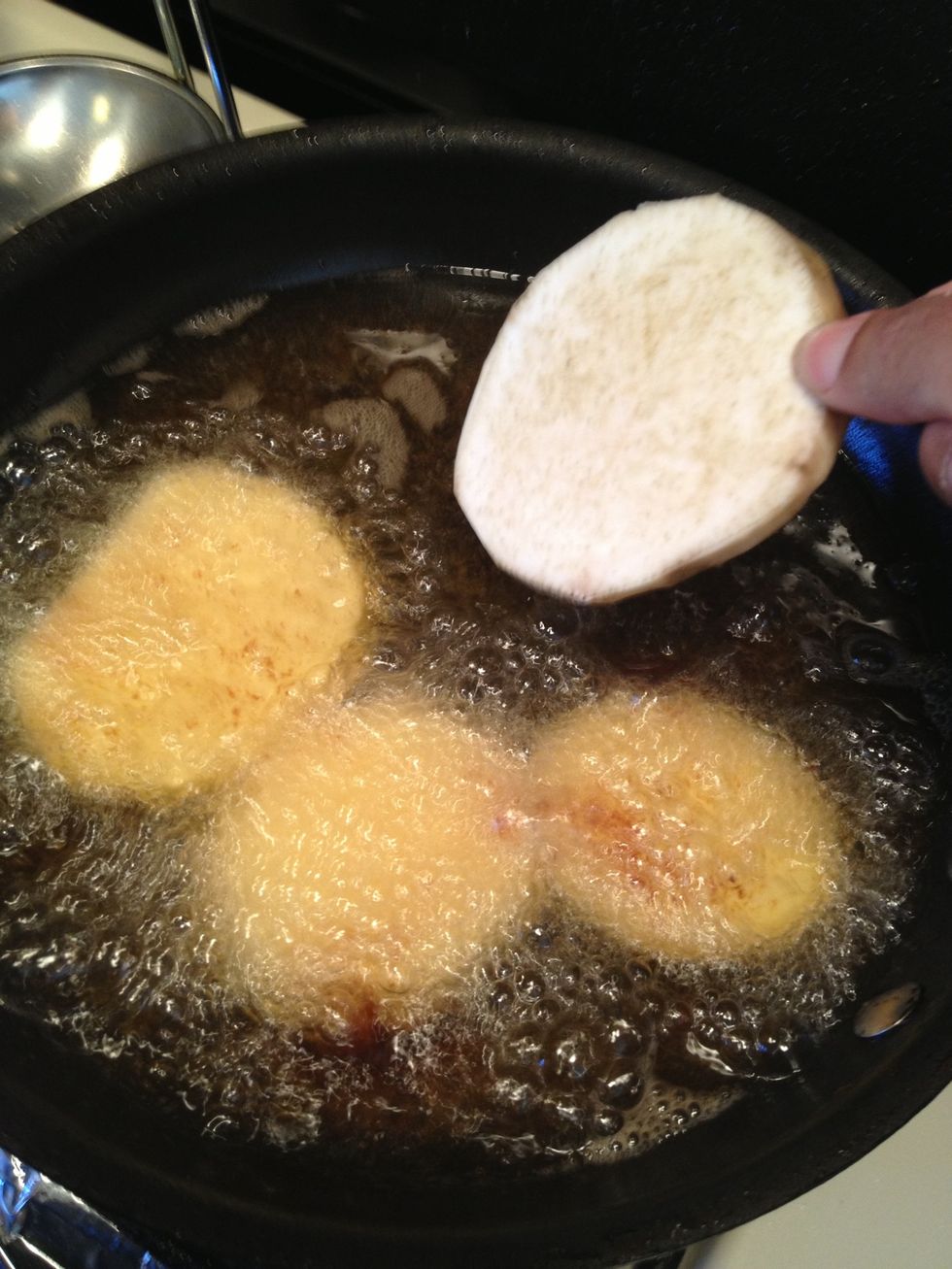 After 30 minutes remove the slices and pat dry. Now lets continue to the next step, FRYING \ud83d\ude01First lets start by adding some oil to a pan and set it over medium high heat. Add the slices of batata