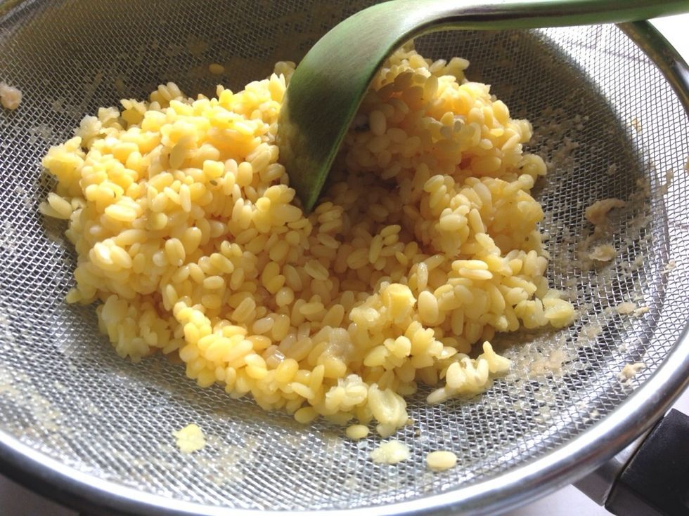 After 30 mnts, u will find the mung dal is much softer. Use the same technique with the lentils, use the back if the wooden spoon, drain the excess water through a sieve