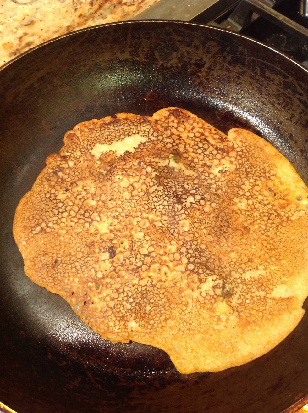 After 4-5 mins, flip the crepe and let it cook uncovered for another 4-5 mins. Checkout the brown roast!
