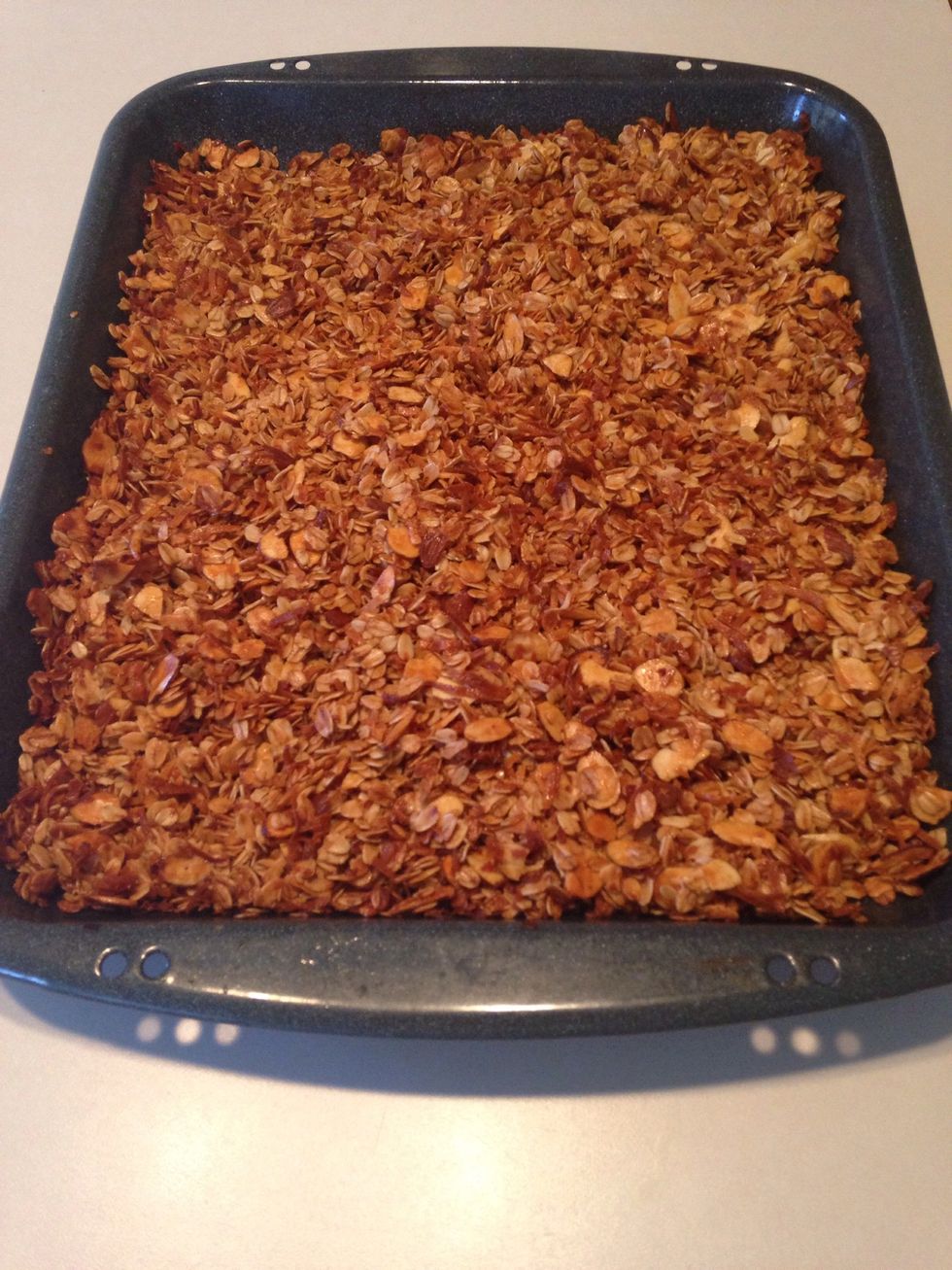 After 45 minutes, your granola looks like this! Remove from oven and stir occasionally as granola cools and hardens.