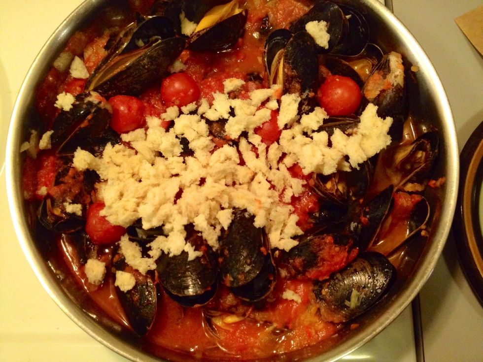 After 5-7 minutes add the teared bread..