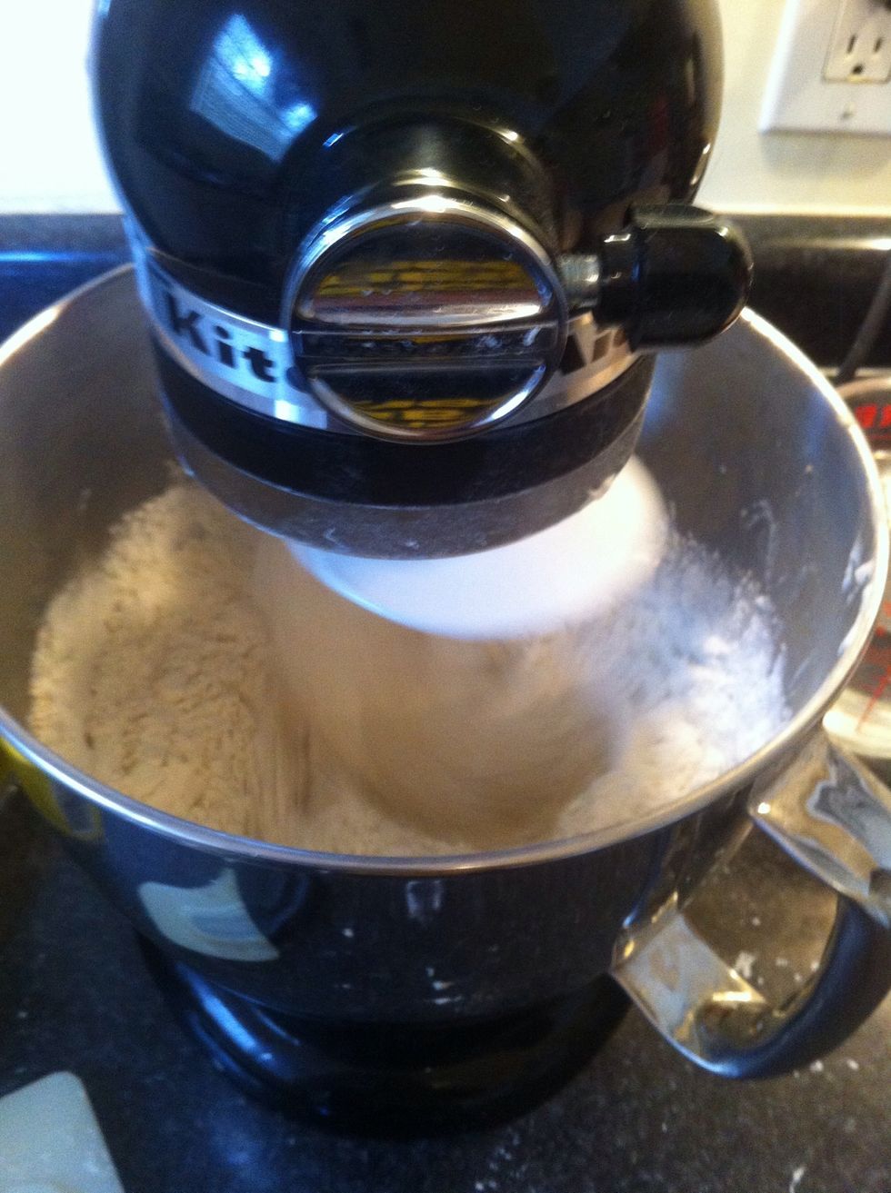 After 5 minutes of mixing, slowly add the rest of the flour. It should take you about 3 minutes to incorporate the rest of the flour.