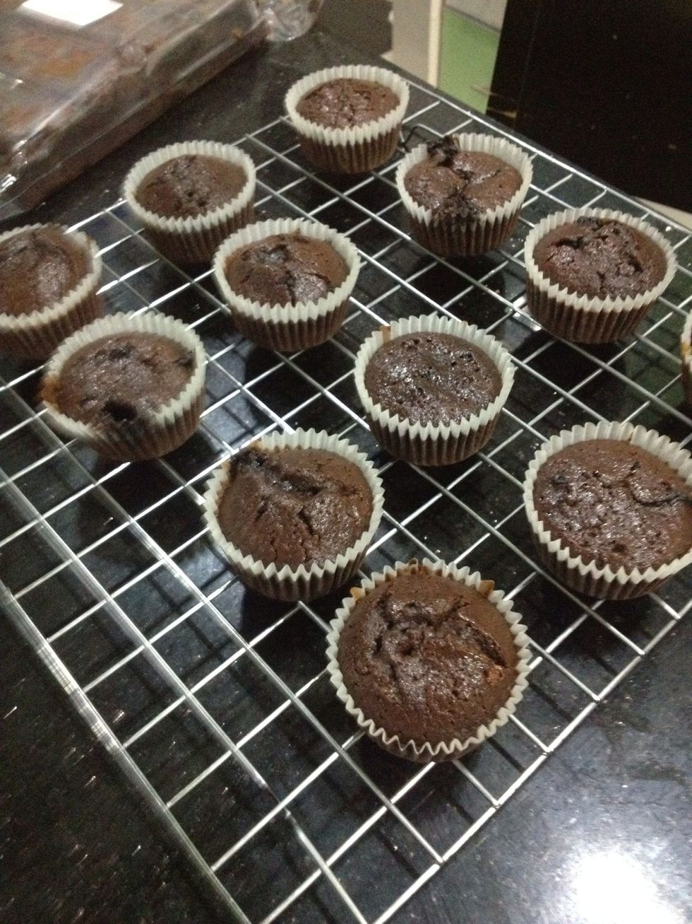 After 5 minutes of the cupcakes being in the pan, transfer them onto a cooling rack and cool completely(!) before frosting!