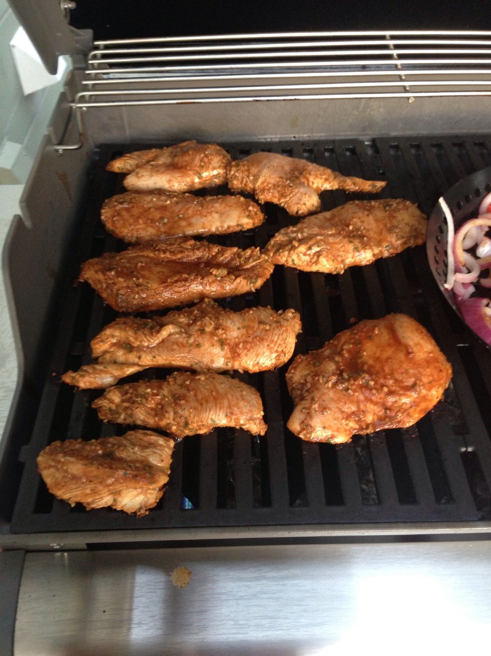 After 5 minutes of the veggies cooking, it's time to add the chicken. Turn any area the chicken is on to high heat.
