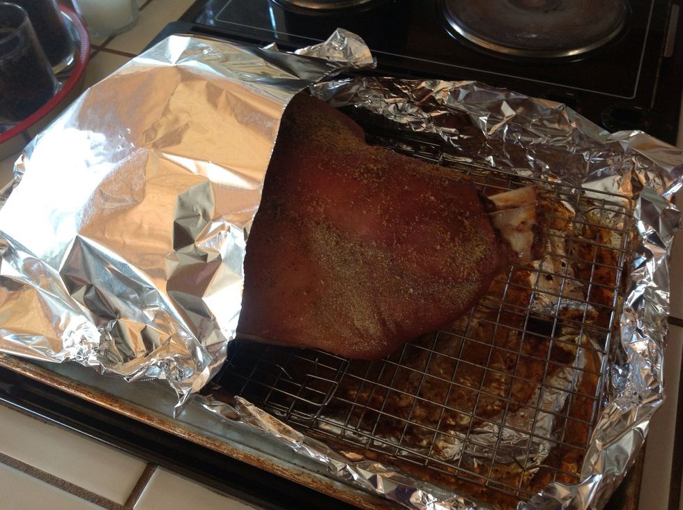 After 8 hours, remove from oven and tent the roast with tinfoil. Allow to 'rest' for 15 minutes. Increase oven temp to 500 degrees, and allow to preheat. Remove foil, return roast to oven.