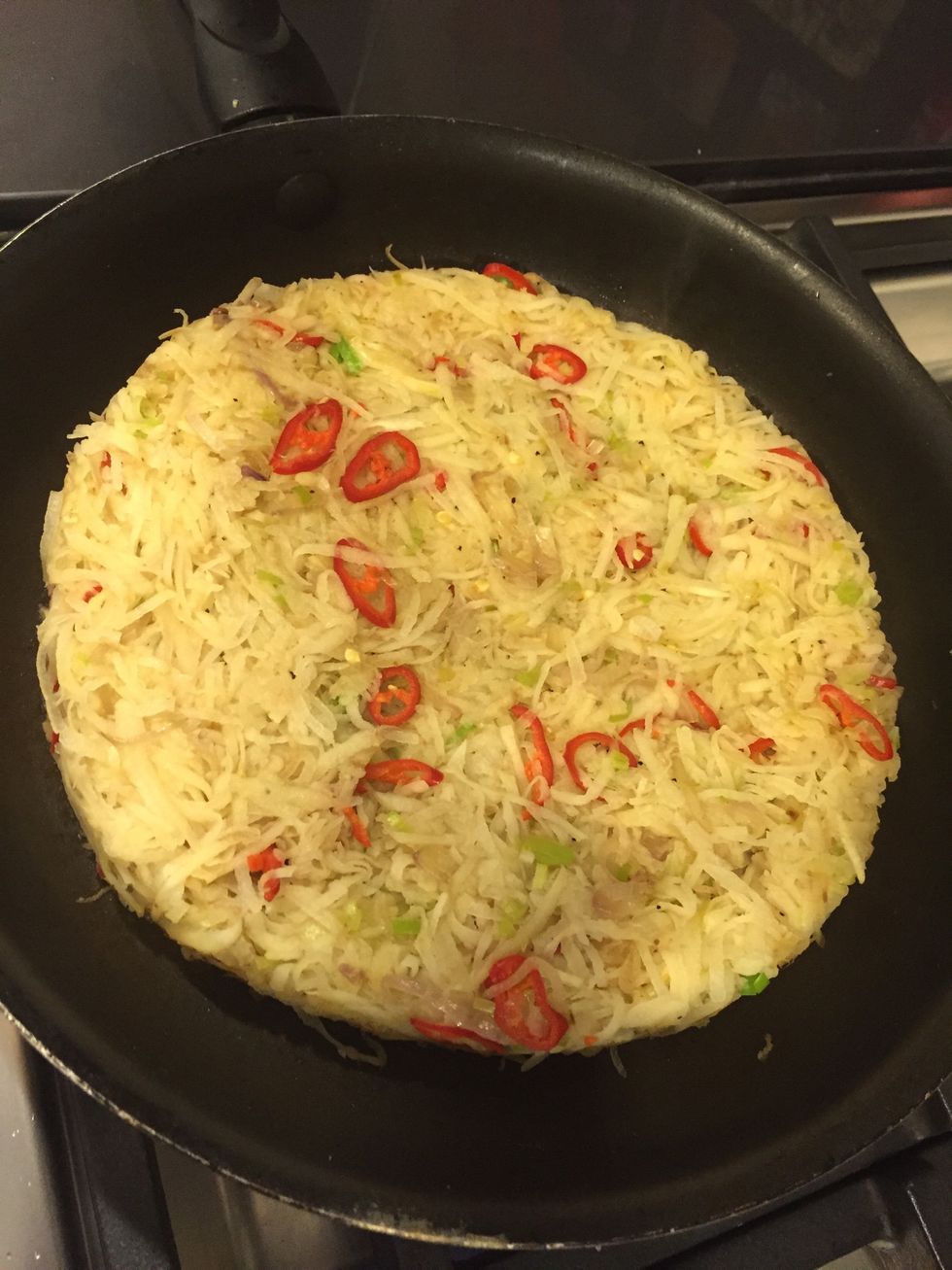 After 8 to 10 minutes remove from heat and set aside. Get plate or baking pan to use to flip over to cook the other side.