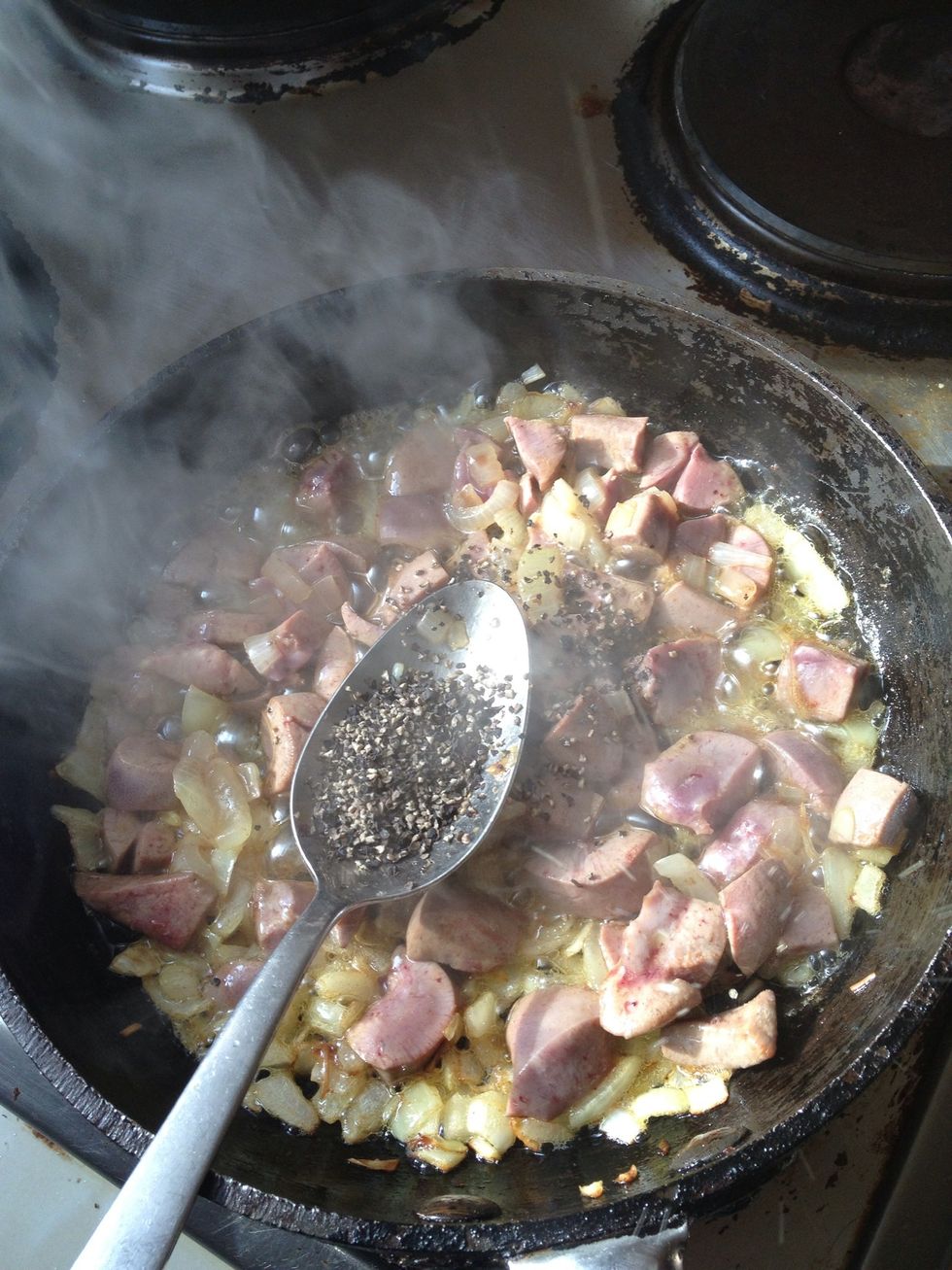 After a couple of minutes add the cracked black pepper, anything from half a teaspoon or more to taste, I like a bit of hit so its just under  half a dessert spoon