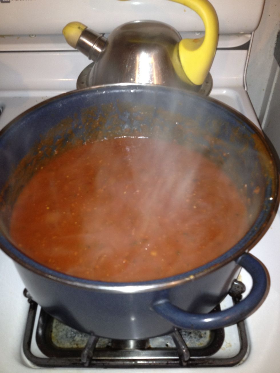 After a few hours, remove the cover & continue to simmer until the sauce thickens. I transferred the sauce to a smaller pot (I need the big one to cook the pasta). Keep stirring too. And tasting!
