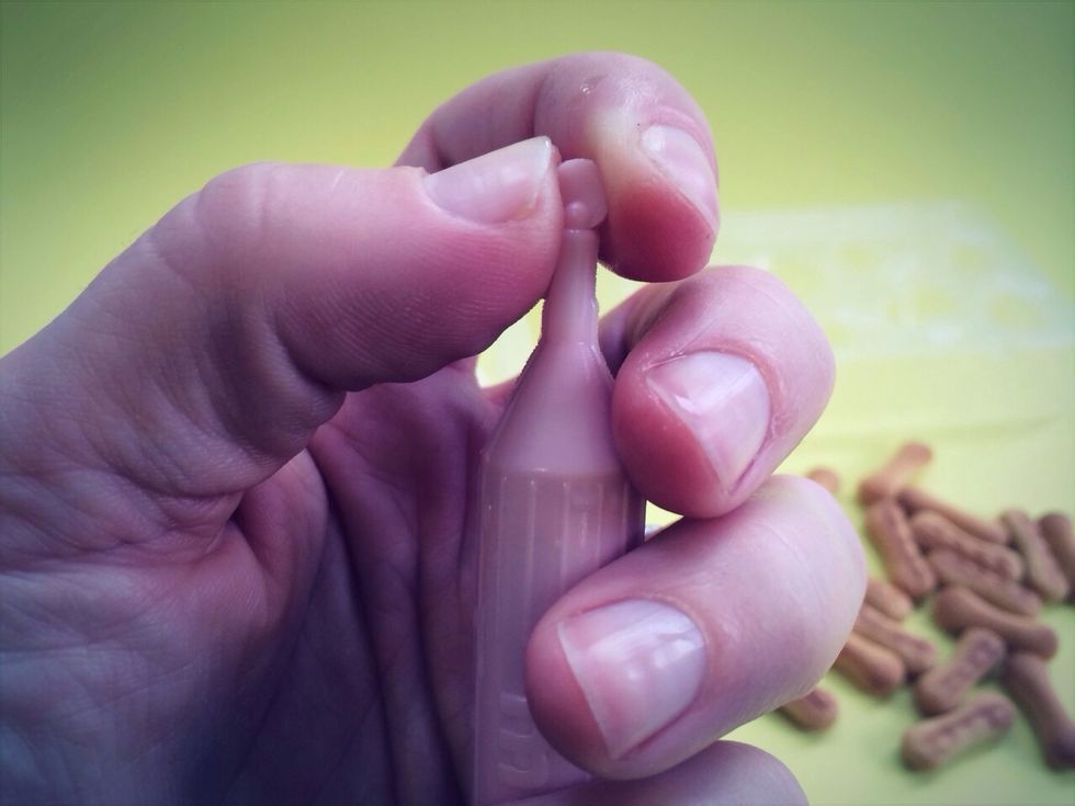 After a few minutes squeeze the tubes to make sure melted, then twist cap off