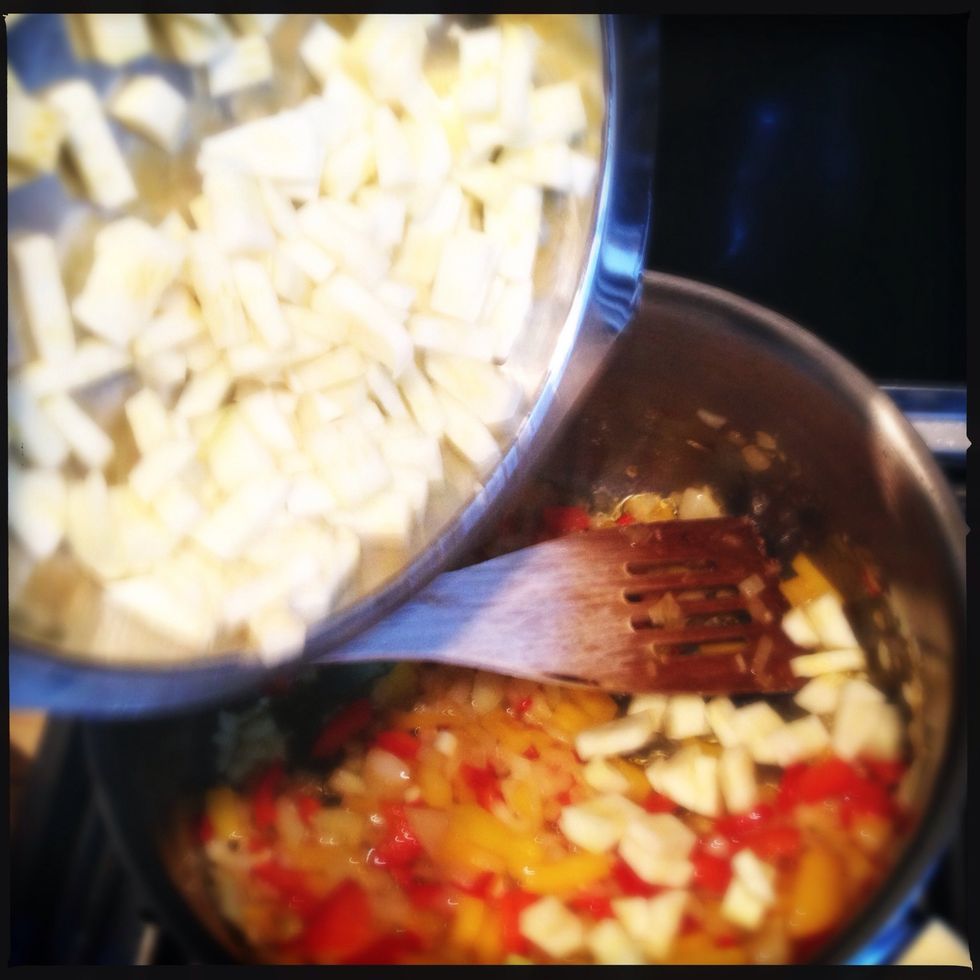 After a few minutes stirring, put in the zucchini.