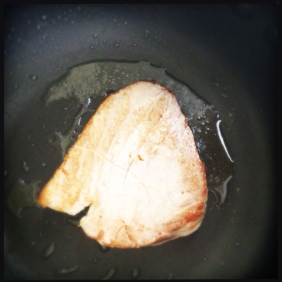 After a minute, flip your tuna.