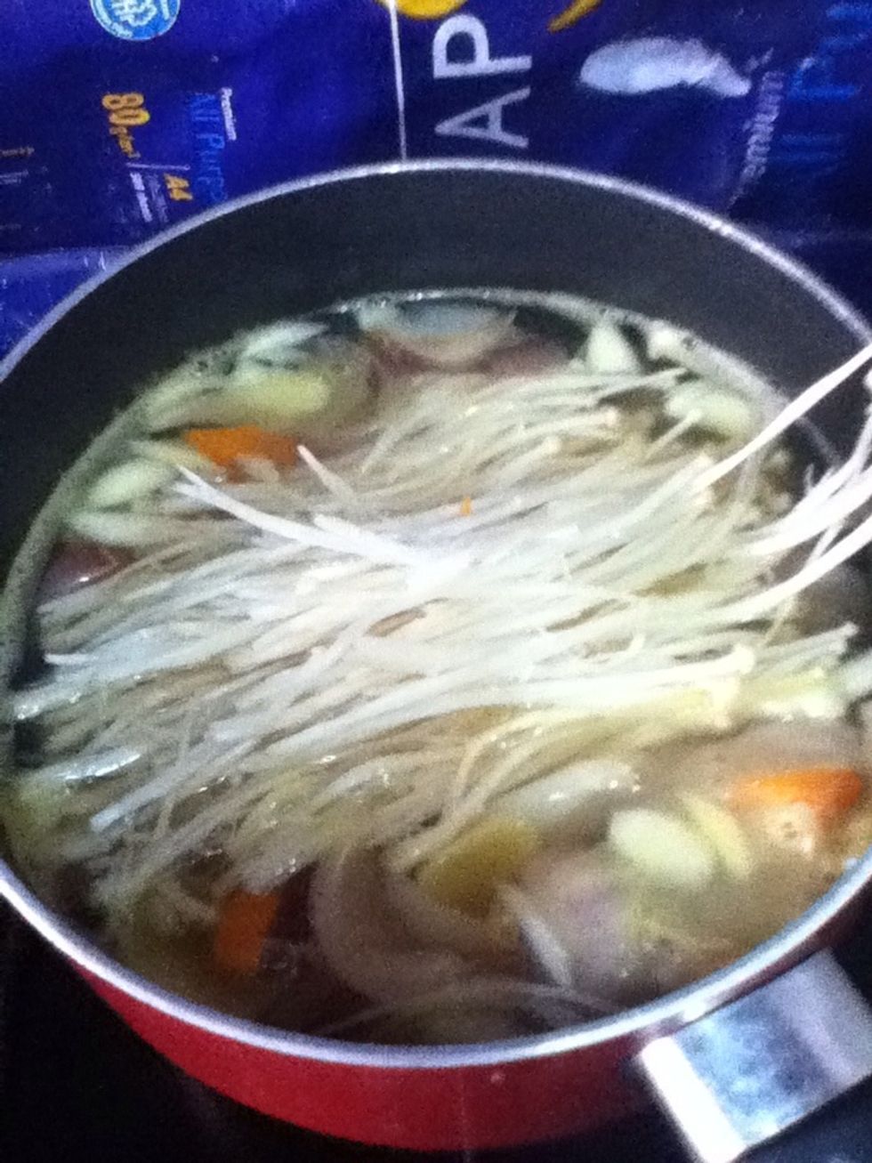 After a minute or so, add the Enoki mushrooms. You could use different types of mushrooms depending on your likeness :) Let it continue to boil till it turn soft.