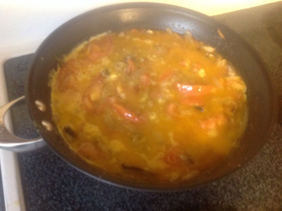 After a minute or two add the eggs that you scrambled.