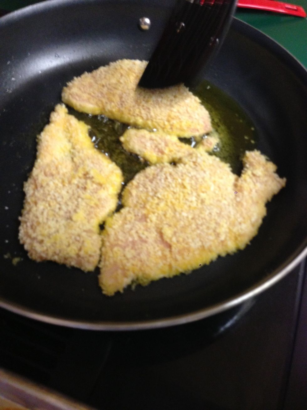 After about 10 minutes, the edges of the chicken are starting to brown