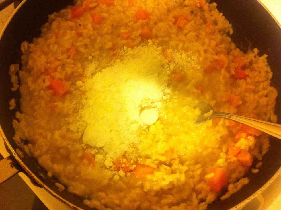 After about 20 minutes of nursing the risotto add the remaining butter and the parm cheese.
