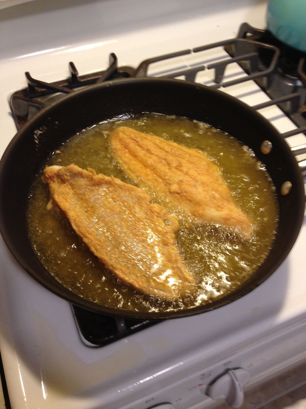 After about 3-4 minutes, flip your filets. Again, be very careful when you're doing this so you don't burn yourself. Cook another 3-4 minutes or until done.