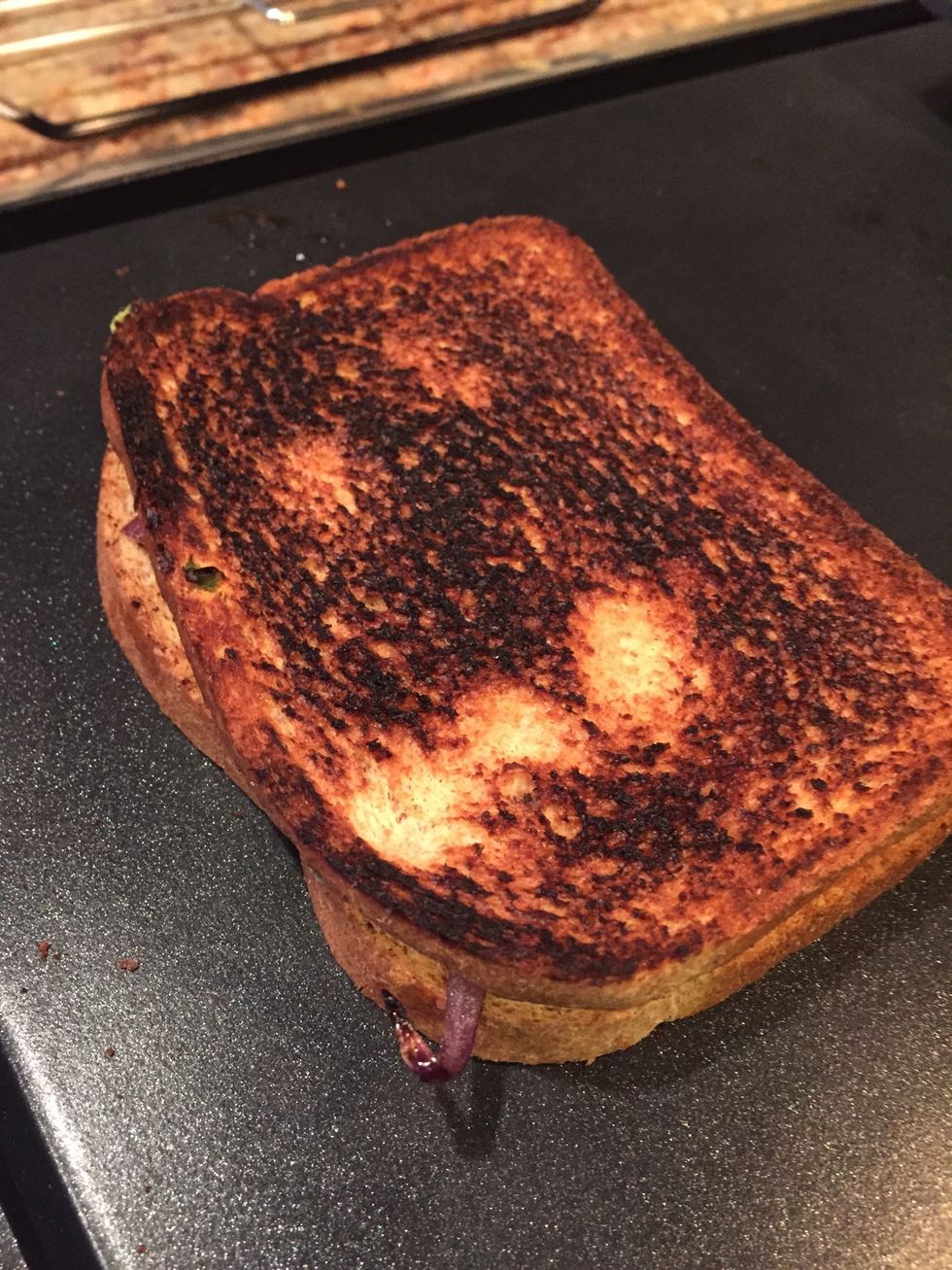 After about 30 seconds, apply some butter to the other side and flip.