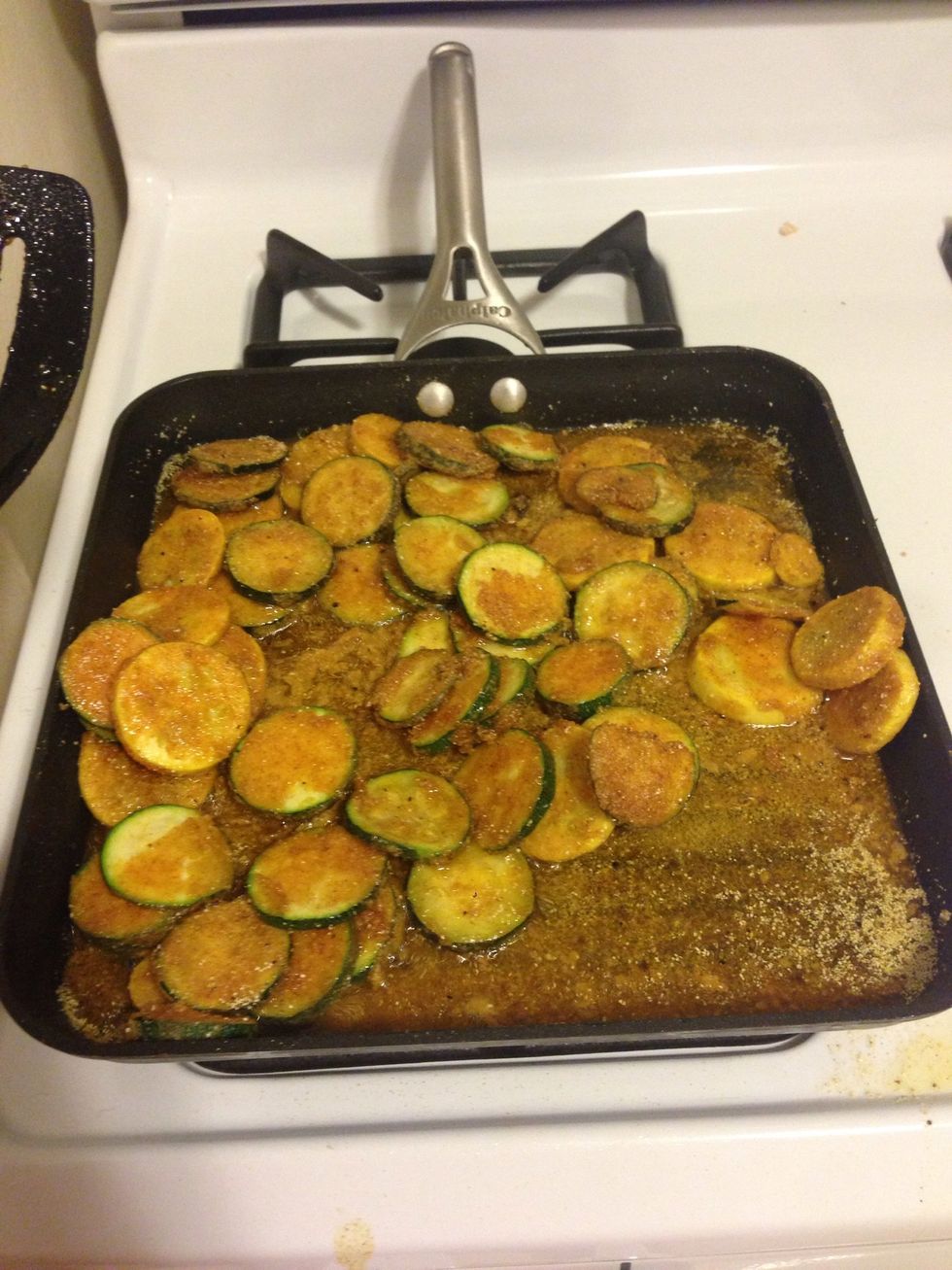 After about 5 mins of until golden brown, flip the slices. Make sure they are submerged in the oil. Cook the other side until golden brown.