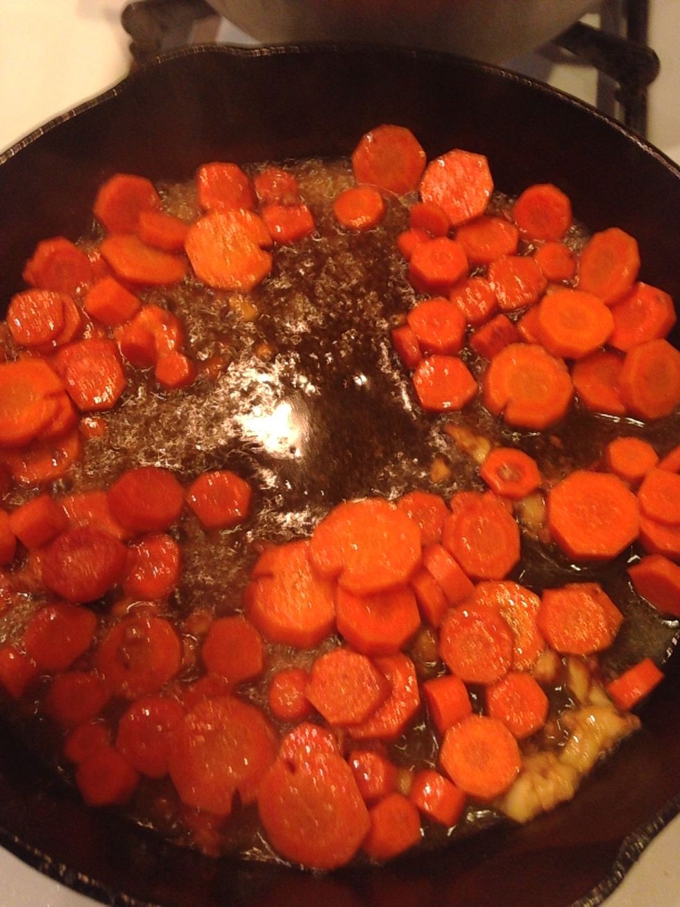 After about 7 minutes, take the lid off the pan and add in your brown sugar and give it a stir.