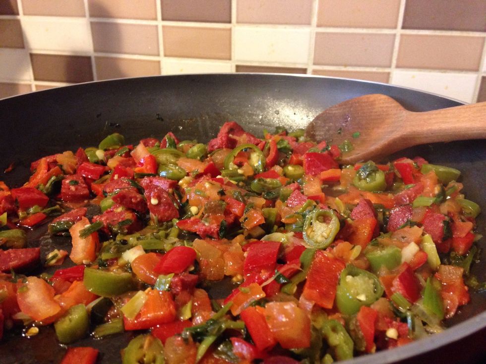 After about 8 minutes in total all the veg and sausage will be softened ready for the quiche.