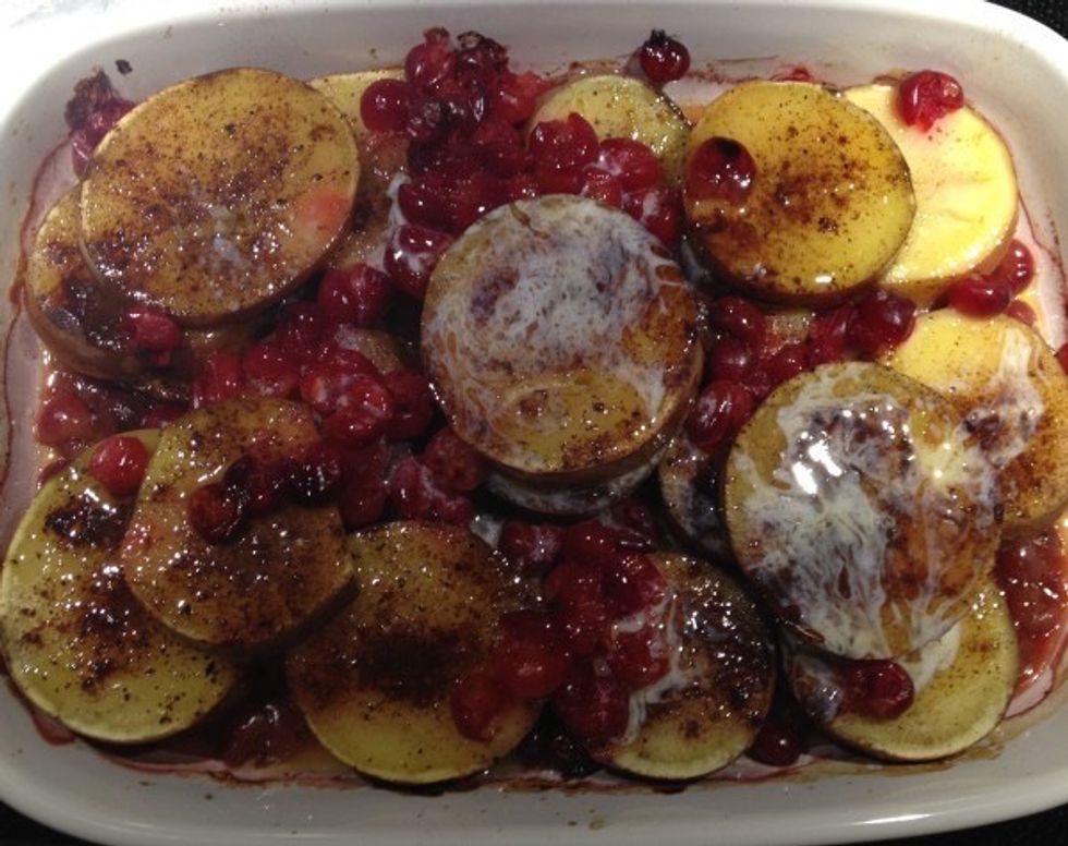 After about an hour check to see if the potatoes are soft. When they are very fork soft drizzle on about a half a cup of melted butter or coconut butter would probably be awesome and make it Paleo!