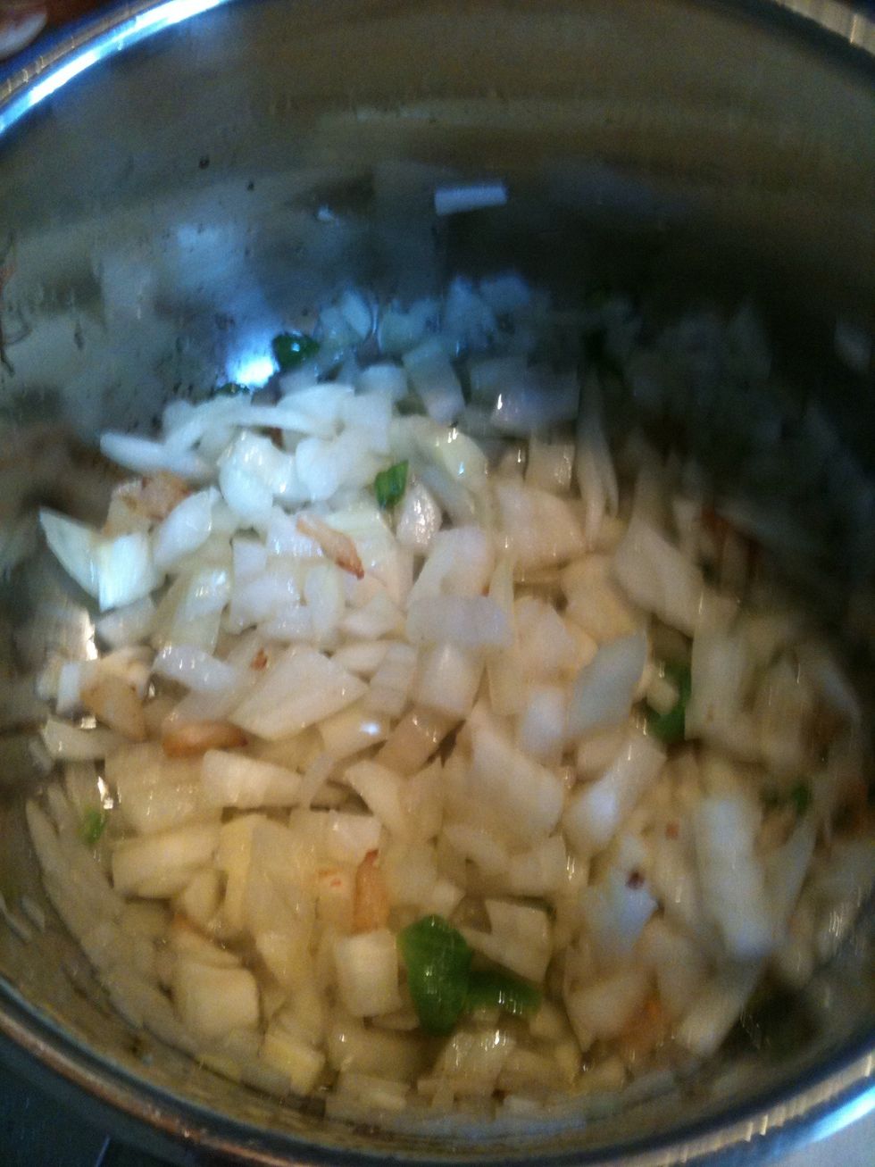 After about half a min add chopped onions
