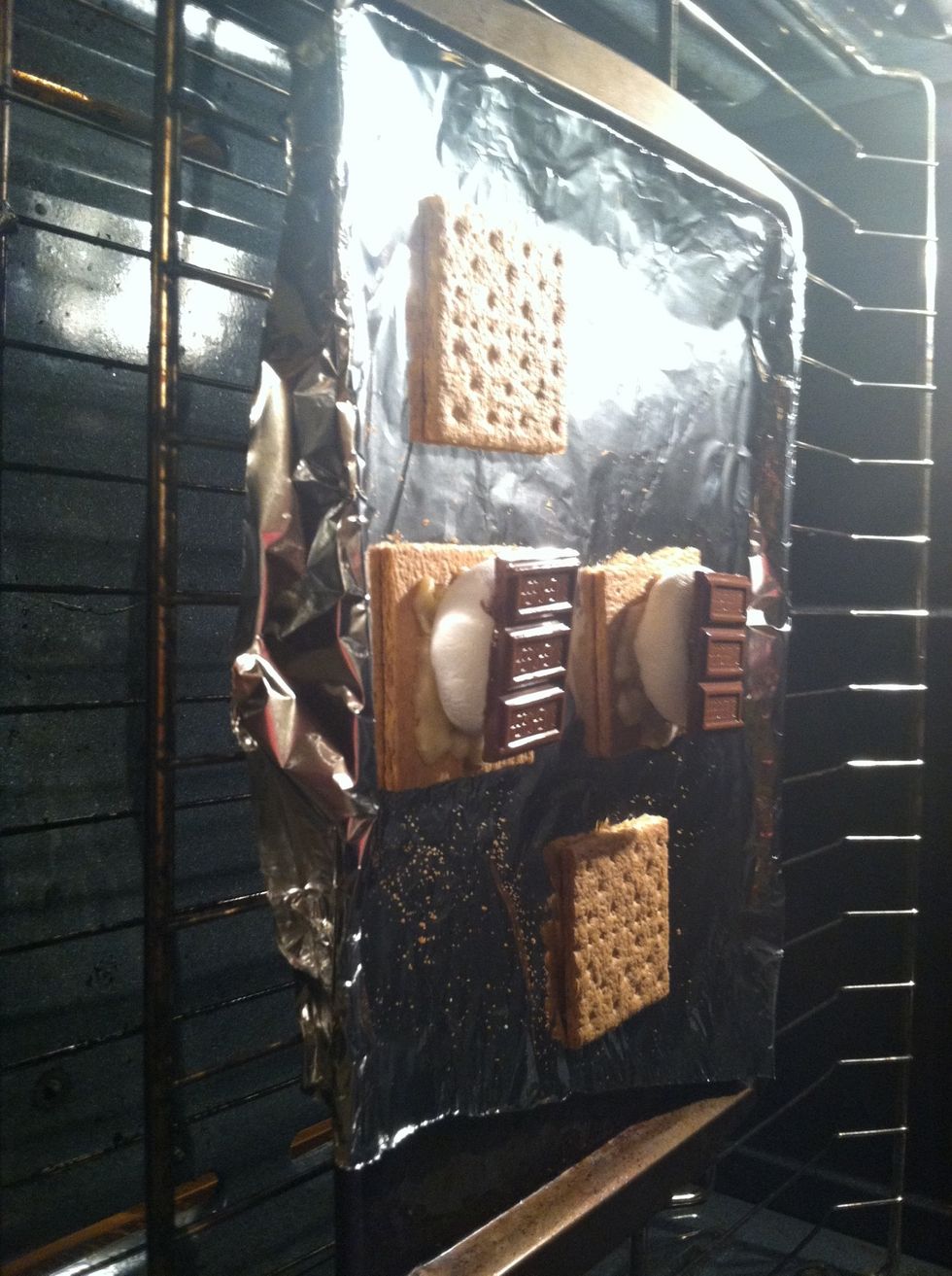 After about two minutes add chocolate on top for about one minute or so then remove from oven