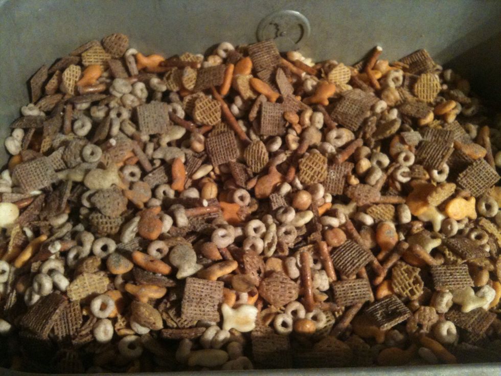 After adding half the butter start adding the spices. Not all at once but a bit at a time so it covers must of the mixture. Once you finish all the butter and spices leave in oven for another 20mins.