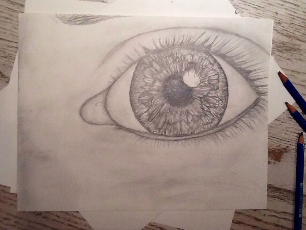 After adding some shading around the eye and going back over the eyelashes a few times, take a step back from your piece and make any adjustment that you feel are necessary.