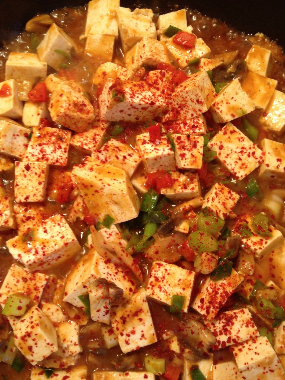 After adding the red pepper powder, heat it for about 4-5 minutes in medium high heat
