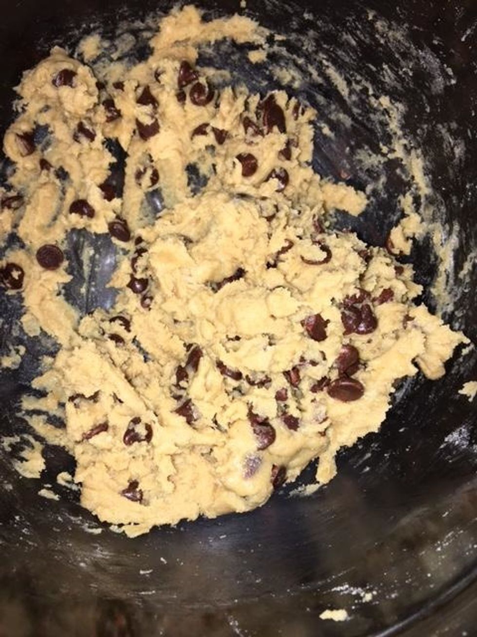 After adding those ingredients, you then stir it until soft dough form
