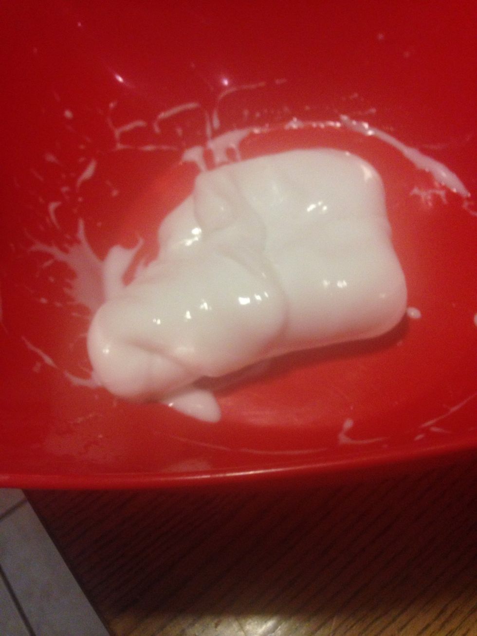 After all of your glue and your borax is all mixed together put your solution into your glue bowl that you're glue used to be in