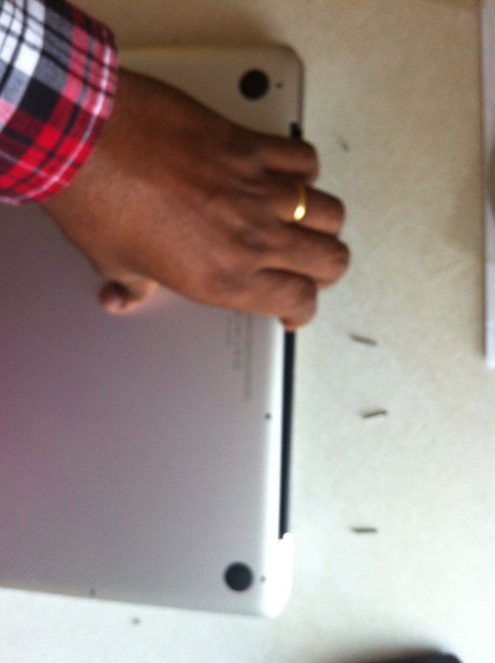 After all the screws are off remove the cover by gently lifting