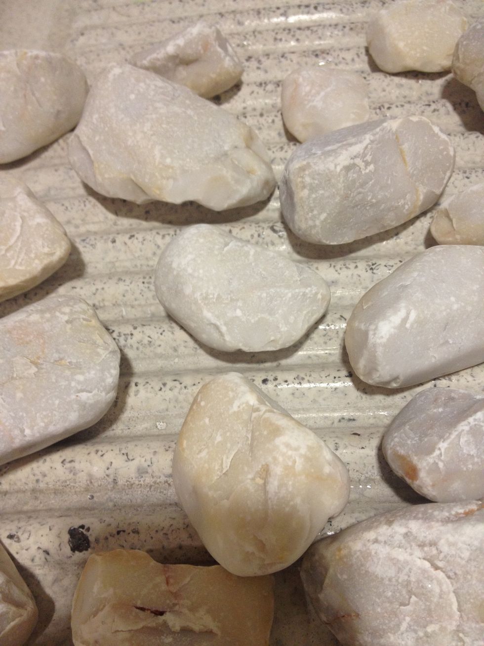 After all the scrubing really rinse the stones! Keep in mind they'll go back to your tree's pot so use lots of water!