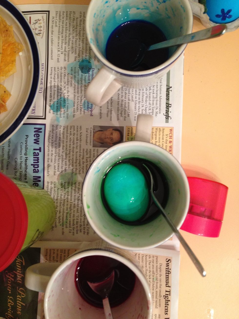 After all your eggs have been decorated to your satisfaction, dip the last one into a dye cup.